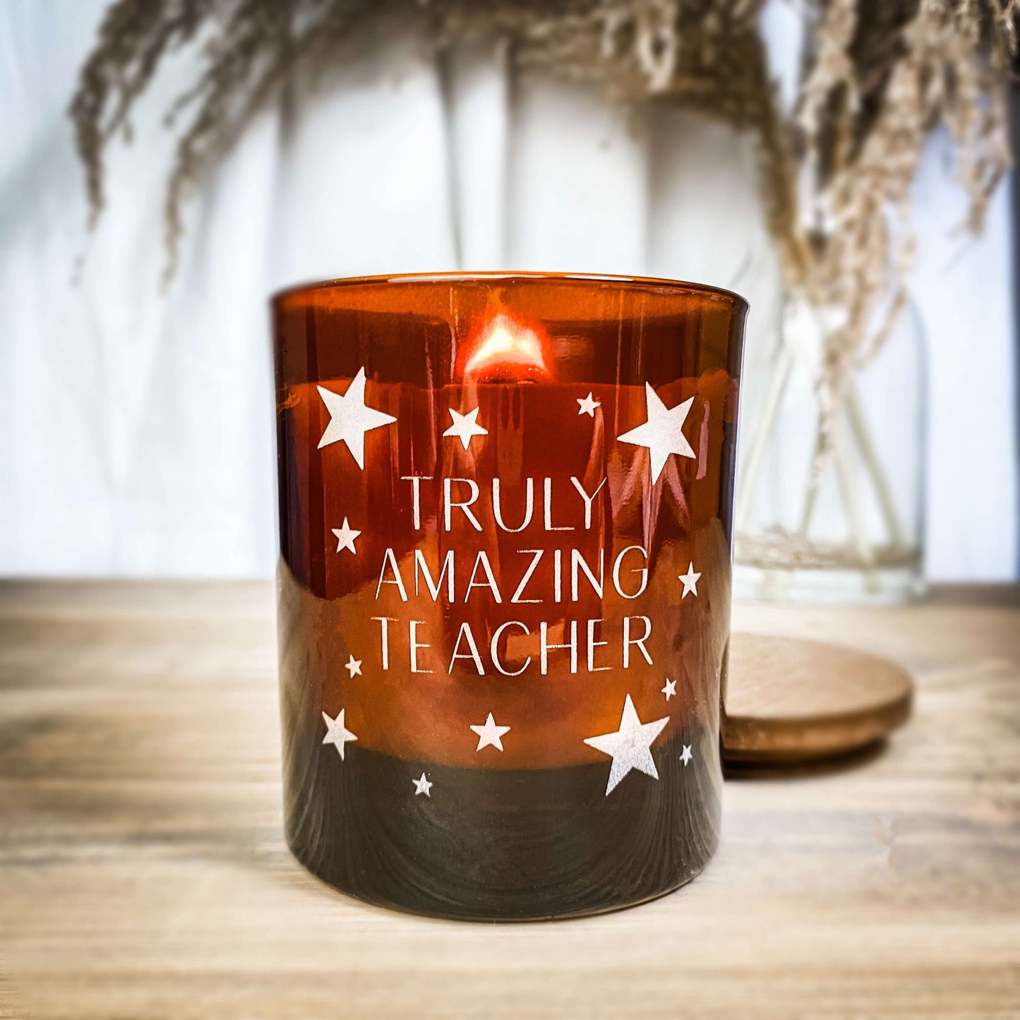 A laser etched 'thank you teacher' candle.