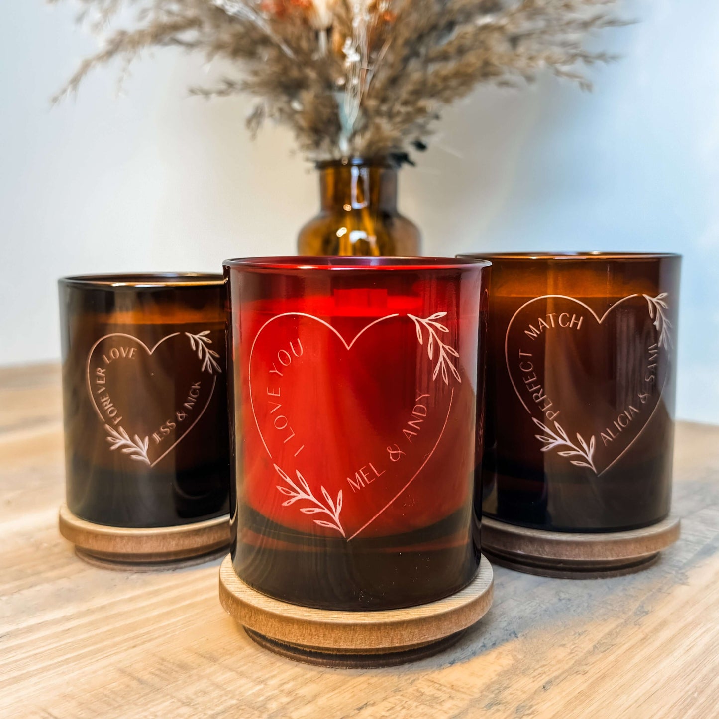 An example personalised valentines candle featuring our heart wreath design.