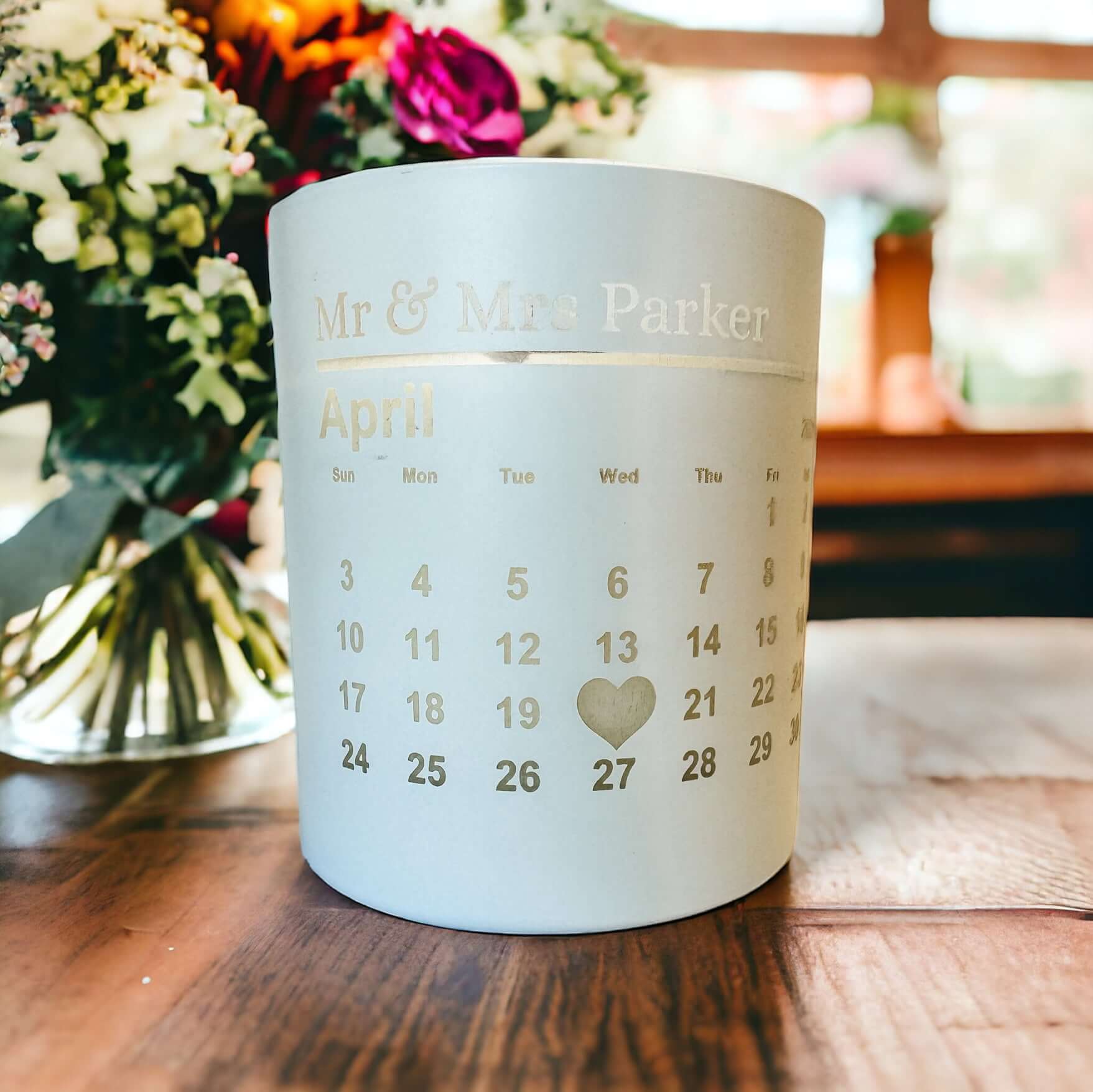 An example personalised wedding candle featuring our calander design.